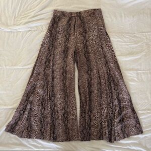 Anthropologie high waisted snake print wide leg flowy pants